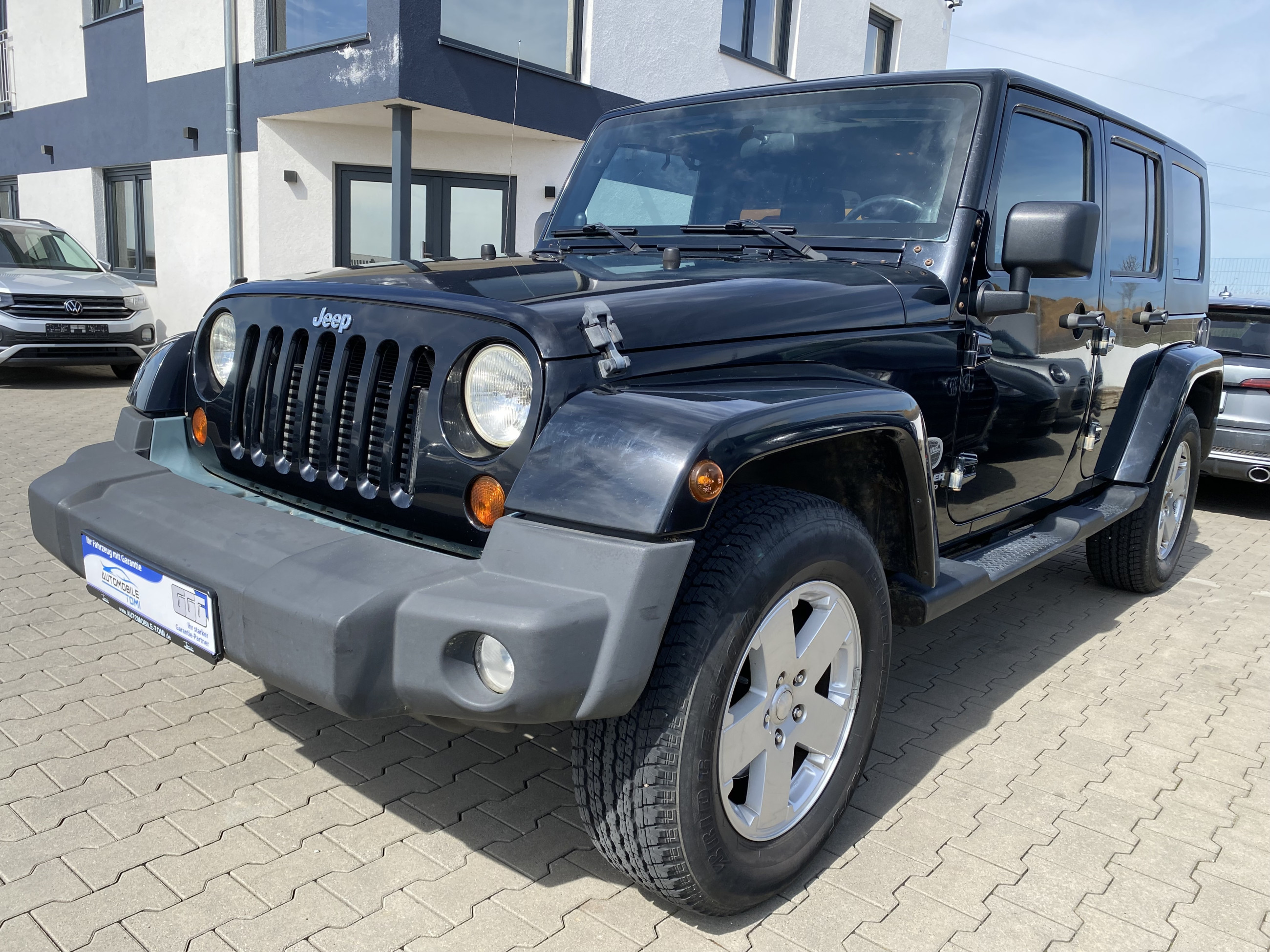 Jeep Wrangler Sahara/Leder/Navi/TÜN NEU/SOFTTOP - Bild 1